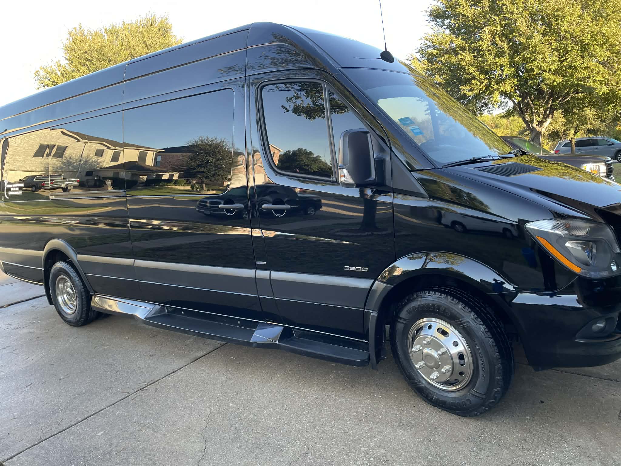 Black luxury Sprinter van for executive and group transportation in Dallas–Fort Worth